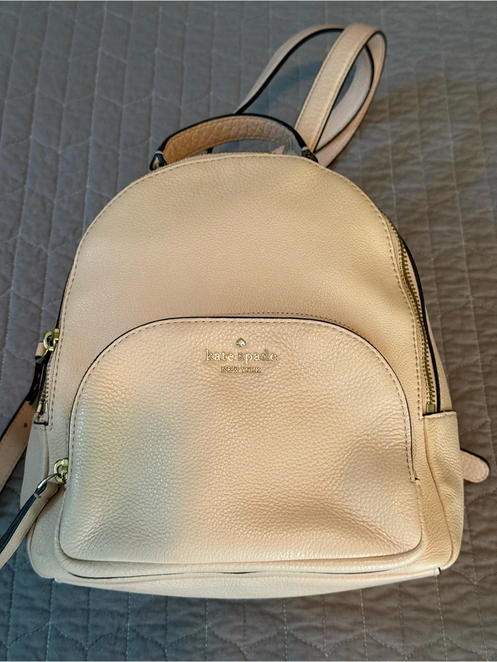 kate spade pebble leather mini backpack in blush beige